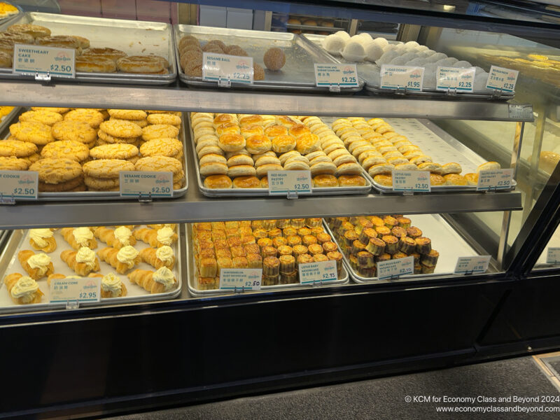 a display case with pastries and pastries