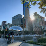 a group of people walking in a city