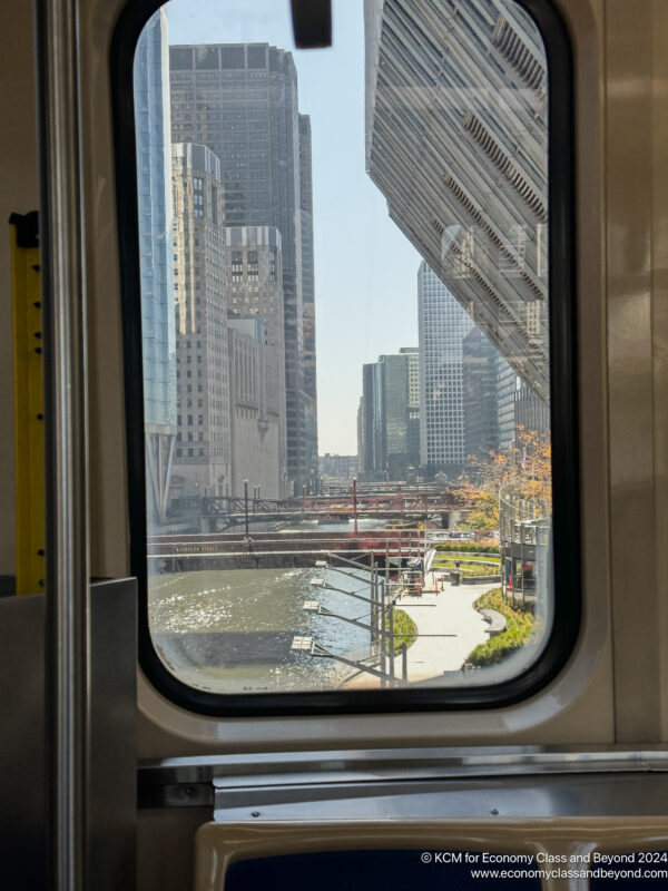 a view of a city from a train window