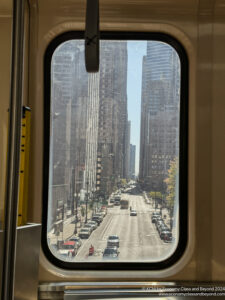 a view of a city from a bus window