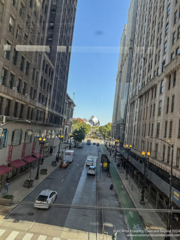 a street with cars and buildings