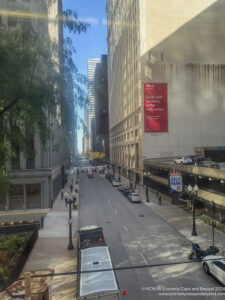 a city street with cars and buildings