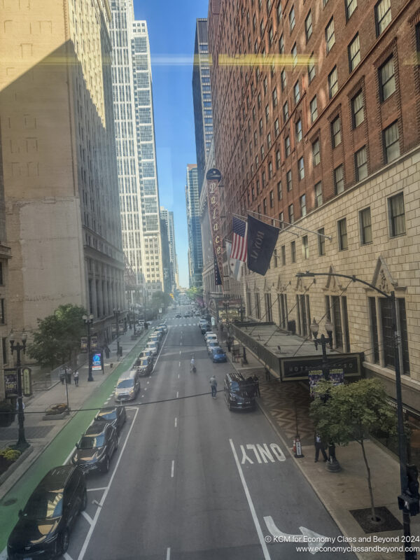 a street with cars and buildings