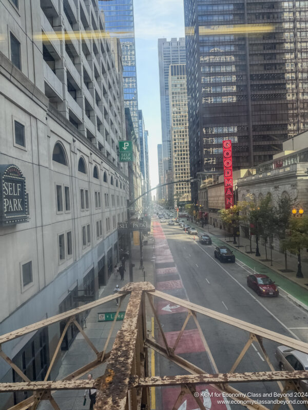 a view from a balcony of a city street