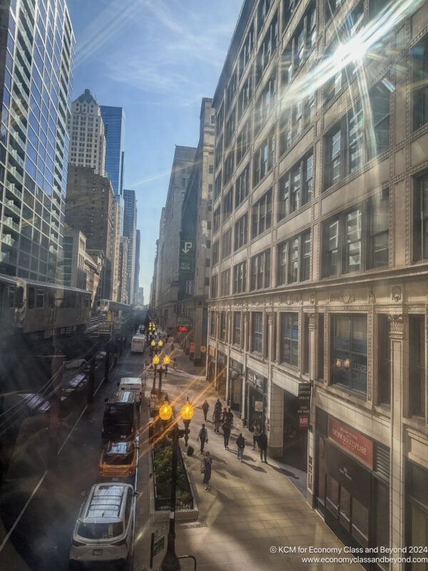 a city street with people walking on it