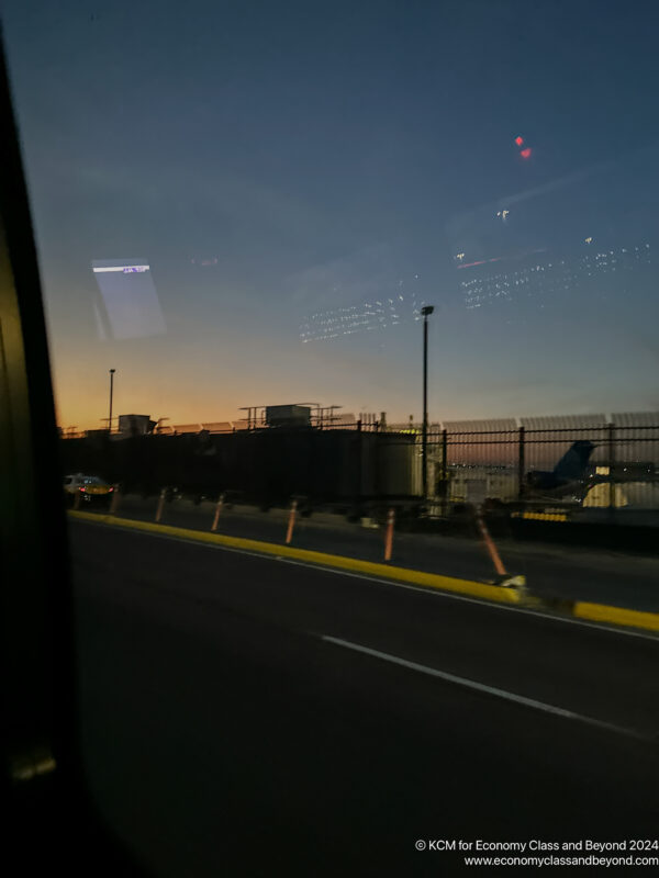 a view from a car window of a runway