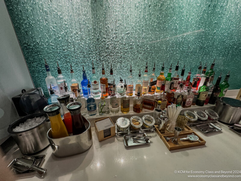 a bar with many bottles of alcohol