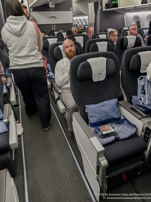 a group of people in an airplane