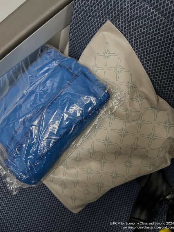 a blue towel in a plastic bag