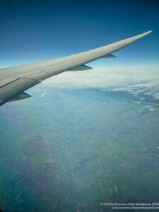 an airplane wing in the sky