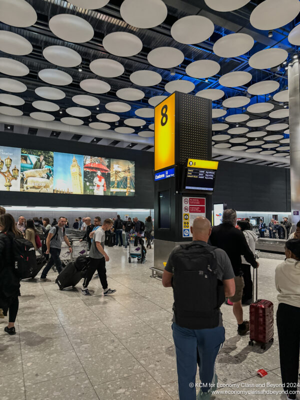 a group of people in a terminal