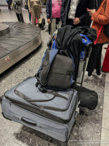 luggage on a cart with luggage