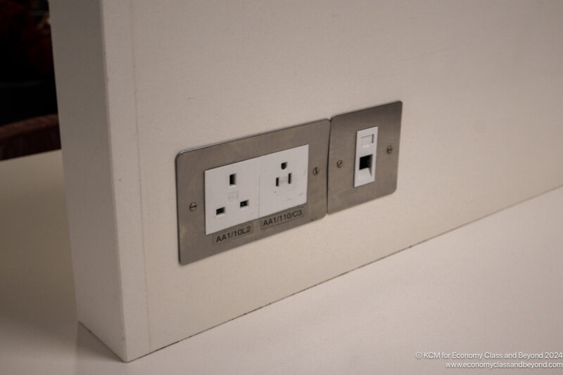 a wall outlet with a couple of plugs