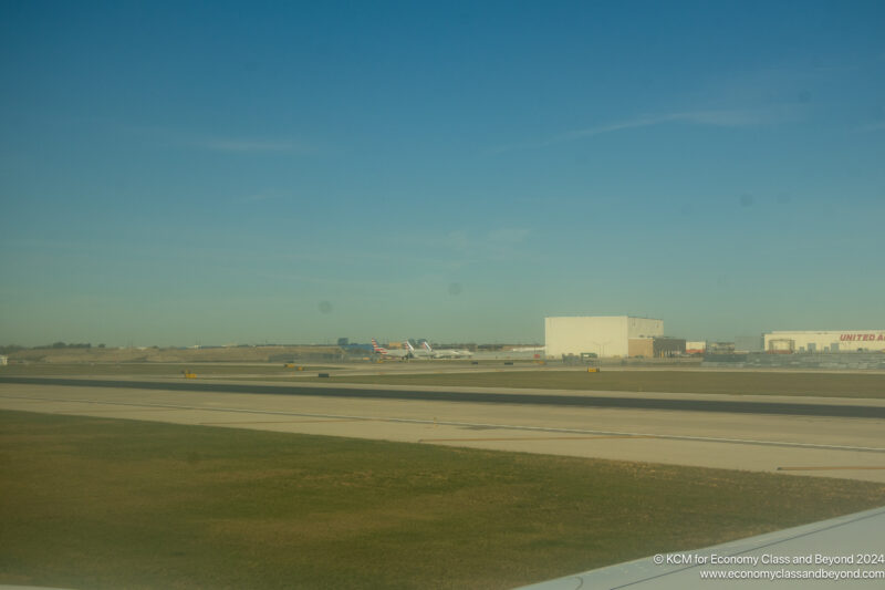 a runway with planes on it