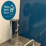 a water refill point sign