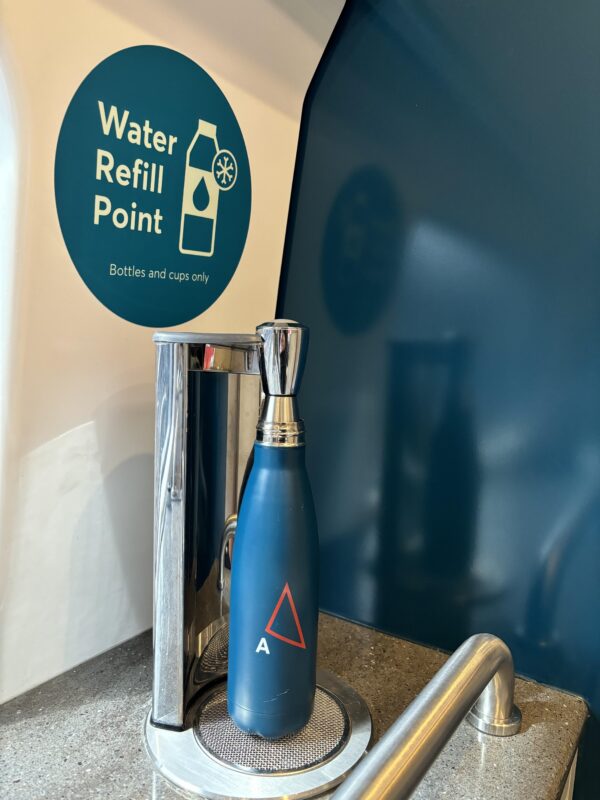 a blue bottle on a counter