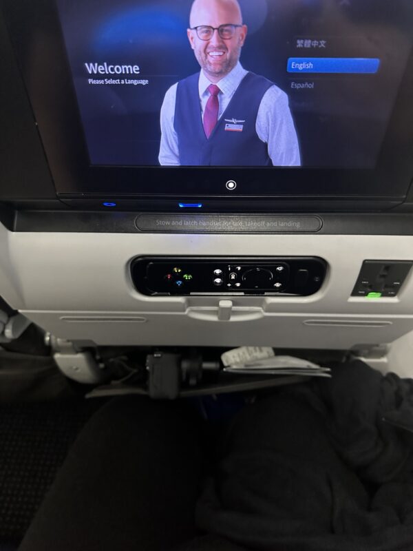 a tv screen on a plane