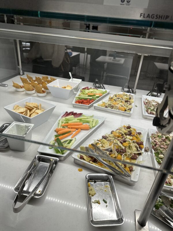 a trays of food on a counter