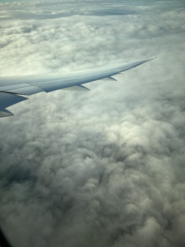 an airplane wing in the sky