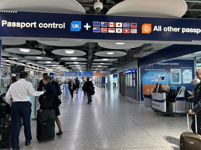 people in a terminal with people walking