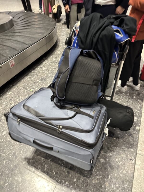 luggage on a cart with luggage