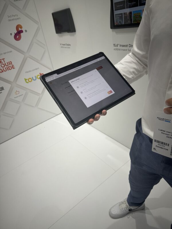 a person holding a tablet