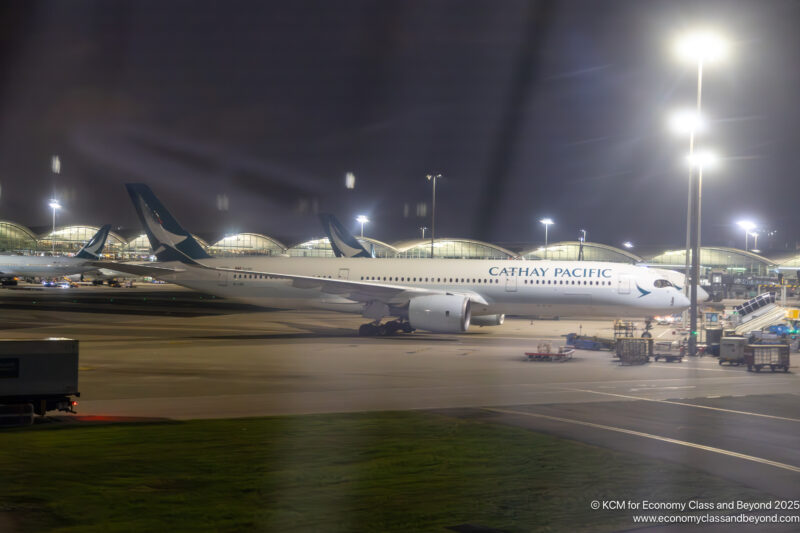 Cathay Pacific Airbus A350-900 parked at Hong Kong International Airport at night - Image, Economy Class and Beyond