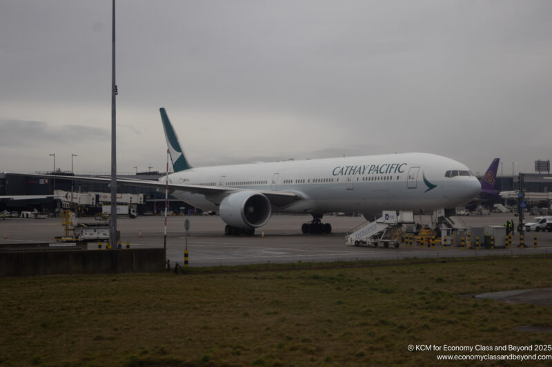 a large white airplane on a runway