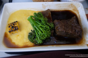 a plate of food with broccoli and meat