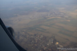 a view of a landscape from an airplane window