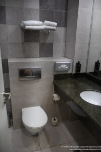 a bathroom with a sink and toilet