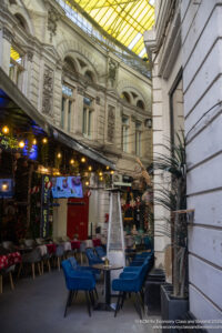 a street with tables and chairs