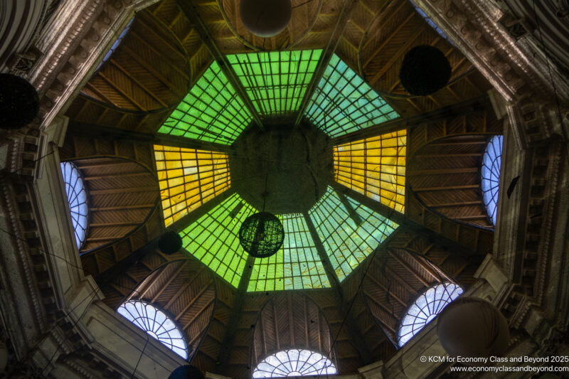 a stained glass ceiling with many windows