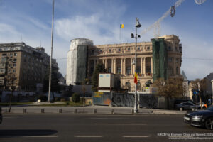 a building with columns and a street light