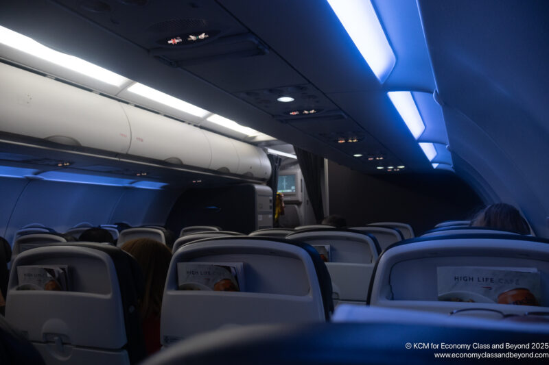 an airplane with seats and lights