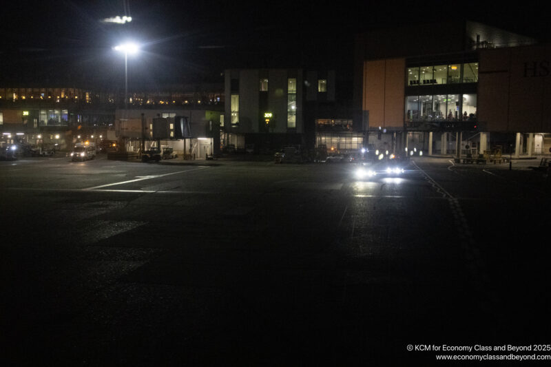 a street with lights on at night