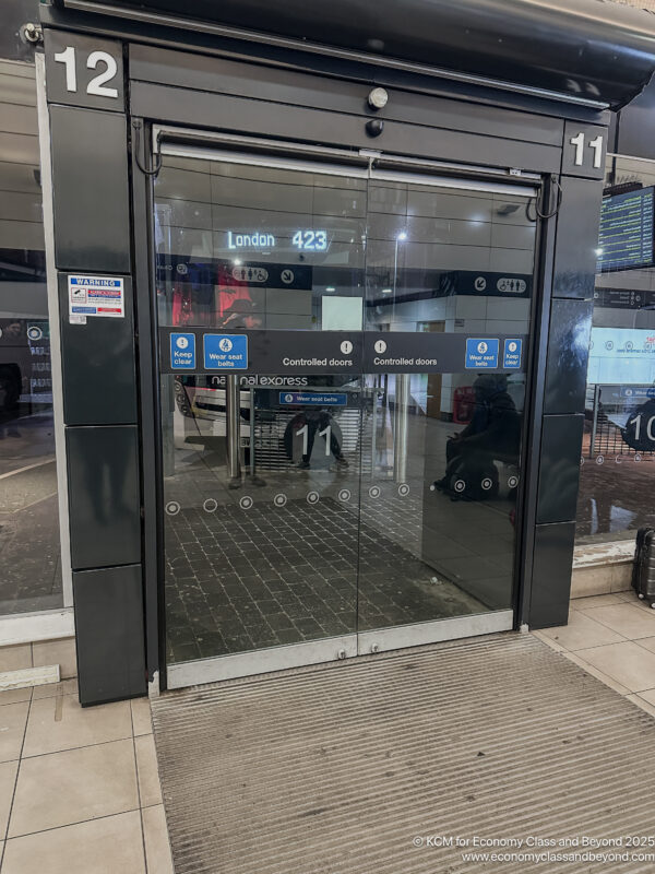 a glass door with a sign on it