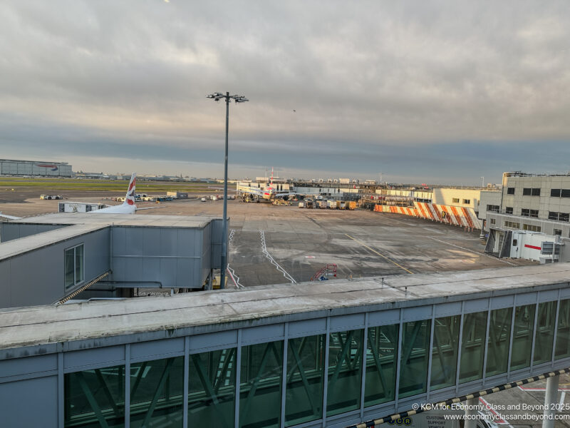 an airport with an airplane in the background