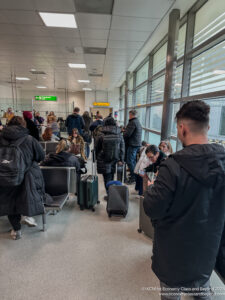 a group of people in an airport