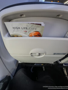 a magazine in the arm rest of a plane