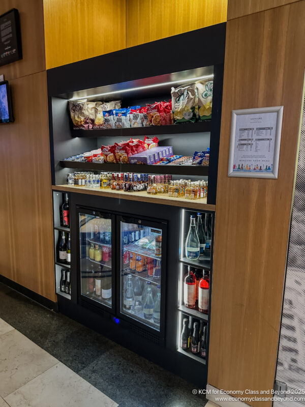 a shelf with food and drinks on it