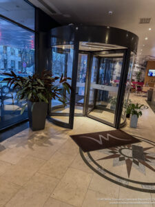 a glass door with a round entrance
