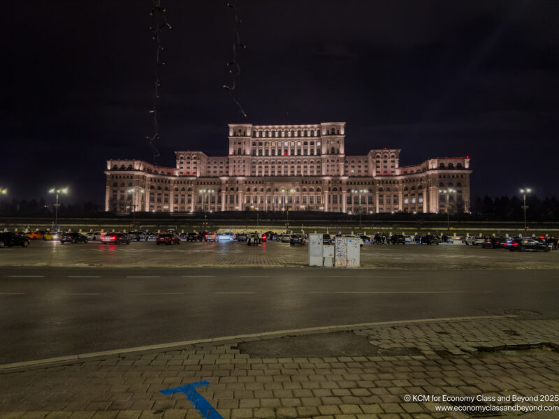 a large building with lights at night