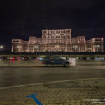 a large building with lights at night