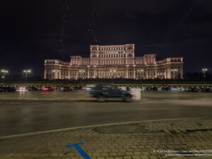 a large building with lights at night