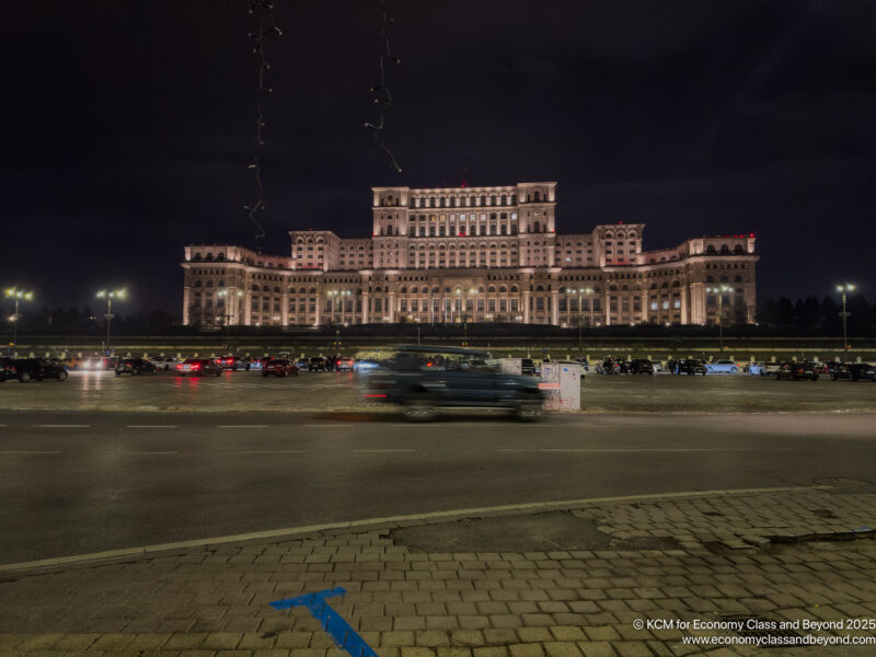 a large building with lights at night