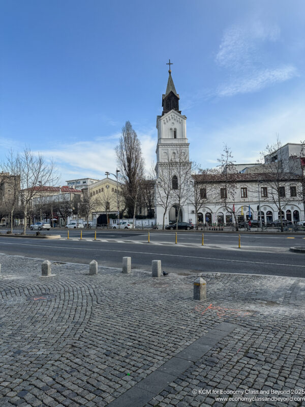 a white building with a cross on top