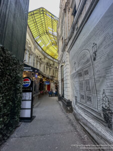 a street with a yellow roof