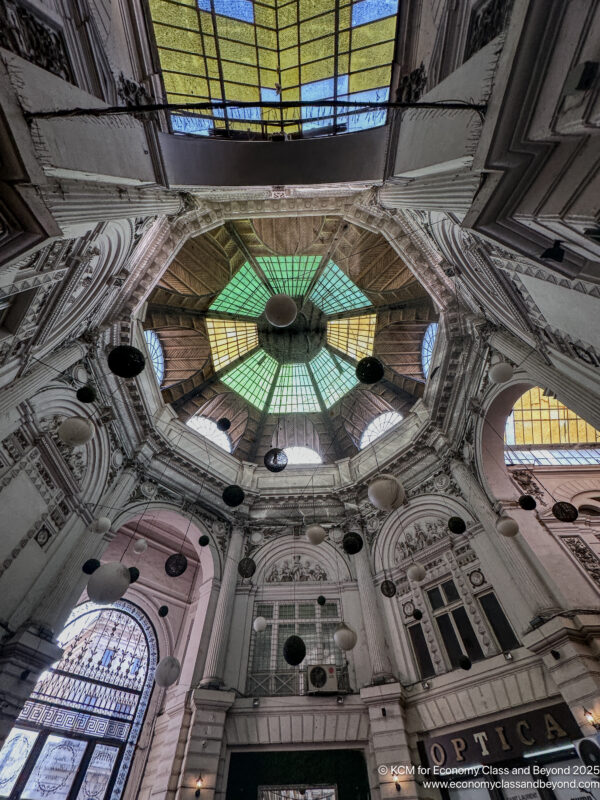 a ceiling of a building with many windows