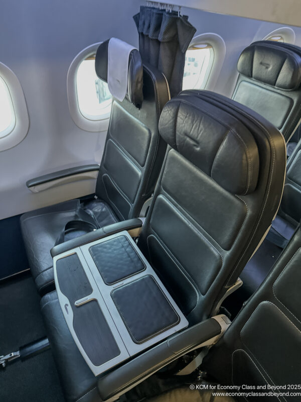 a black leather seats in an airplane